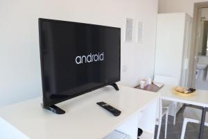 TV a/nebo společenská místnost v ubytování Monnalisa Village