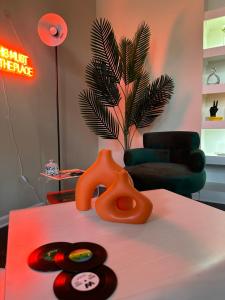 a room with a table with two objects on it at Cozy King 2 bedroom at Easton near Airport in Columbus +1 photo