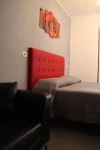 Postel nebo postele na pokoji v ubytování Monnalisa Village