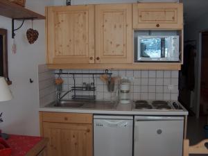 Kuchyň nebo kuchyňský kout v ubytování Appartement de charme à Vars les Claux + 10 fotografií