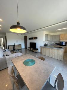 A kitchen or kitchenette at OpenView Apartment Marsaxlokk