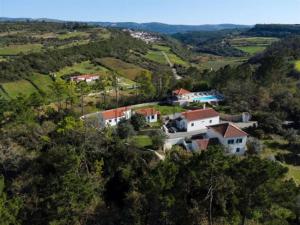 an aerial view of a house on a hill at Quinta Boa Vida in Alcobaça
