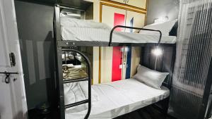 Ліжко або ліжка в номері Da Java 18 hostel and Homestay Chikmagalur