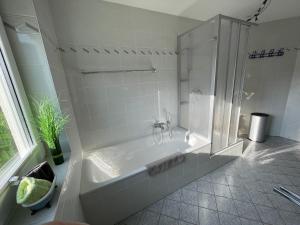Koupelna v ubytování Ferienwohnung FlatNETT + 32 fotografií