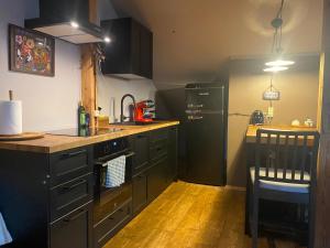 Kuchyň nebo kuchyňský kout v ubytování Konrads Apartment