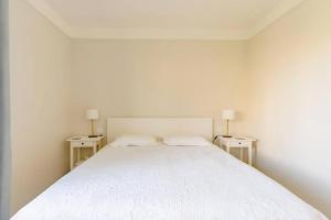 Ένα ή περισσότερα κρεβάτια σε δωμάτιο στο Villa Echauguette, Chambre et toilette privee Maison partagee avec la proprietaire