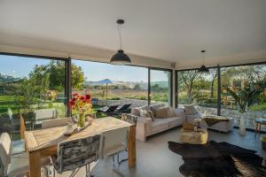Posedenie v ubytovaní Luxury Villa Luminosa