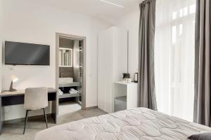 TV a/nebo společenská místnost v ubytování Home 501 Guest House - La Spezia
