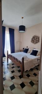 Postel nebo postele na pokoji v ubytování Podere Muracciolo