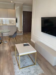 TV a/nebo společenská místnost v ubytování Platinum Towers Hotel Apartments