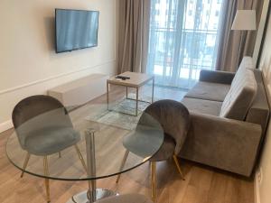 TV a/nebo společenská místnost v ubytování Platinum Towers Hotel Apartments
