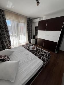 Postel nebo postele na pokoji v ubytování Elegance