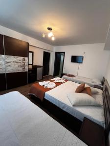Postel nebo postele na pokoji v ubytování Elegance