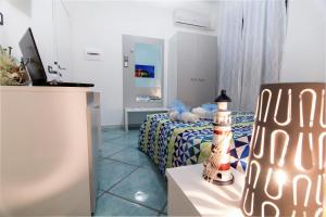 TV a/nebo společenská místnost v ubytování B&B Casa 28