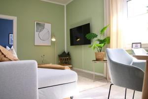 Телевизор и/или развлекательный центр в Garten, Terrasse, 93 m2, 5 Min bis zur Warnow