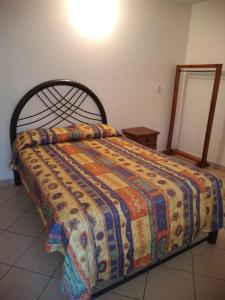 Postel nebo postele na pokoji v ubytování Casa de Huéspedes Hotel'O