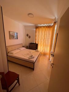 Postel nebo postele na pokoji v ubytování Al Mare Apartments