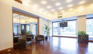 TV a/nebo společenská místnost v ubytování Grand Hotel Elite