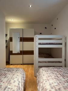 a bedroom with two bunk beds and a mirror at Apartment Villa Istriana in Koper +79 photos