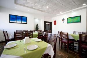 Restoran või mõni muu söögikoht majutusasutuses Hotel de Casa Blanca