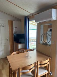 Μια τηλεόραση ή/και κέντρο ψυχαγωγίας στο mobil home à louer
