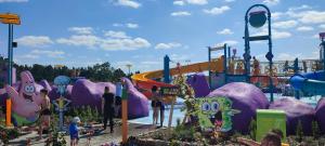a group of people at a water park at Apartament Tiffany in Gdańsk