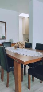a dining room table with debris on it at Casa Jardins da Praia in Póvoa de Varzim