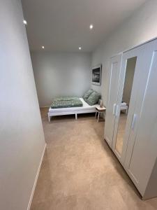 Letto o letti in una camera di Ferienwohnung Kunterbunt