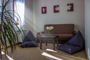 Posezení v ubytování Trigrad Hotel