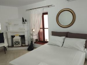 Ένα ή περισσότερα κρεβάτια σε δωμάτιο στο Seminas House