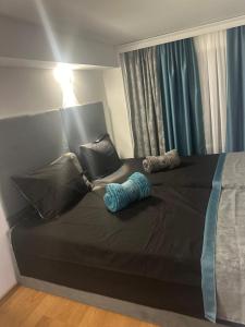 Ένα ή περισσότερα κρεβάτια σε δωμάτιο στο BLuxury apartments +2 φωτογραφίες