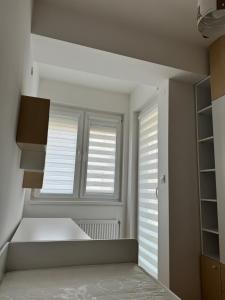 Postel nebo postele na pokoji v ubytování Modern Skopje apartment