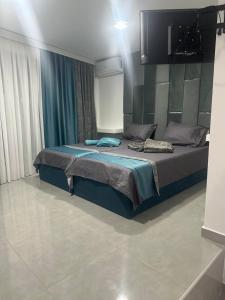 Ένα ή περισσότερα κρεβάτια σε δωμάτιο στο BLuxury apartments