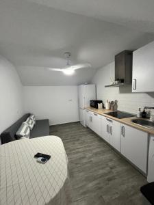 Kuchyň nebo kuchyňský kout v ubytování Candela Apartamento