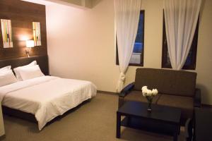 Katil atau katil-katil dalam bilik di Trigrad Hotel
