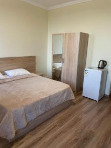Voodi või voodid majutusasutuse DECCA Hotel toas