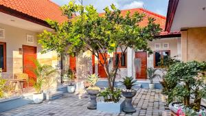 Zahrada ubytování Adhi Homestay