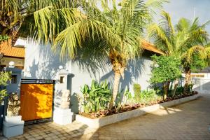 Zahrada ubytování Adhi Homestay