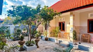 Zahrada ubytování Adhi Homestay