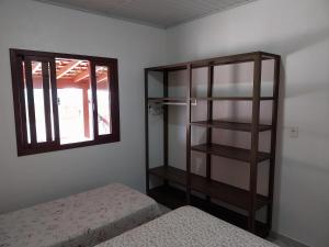 Postel nebo postele na pokoji v ubytování Casa Lagoa e Praia Rosa