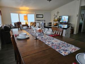 a dining room table with a table cloth on it at Yelm Prairie Vacation Rentals in Yelm