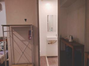 Koupelna v ubytování Bais Homestay Studio Room