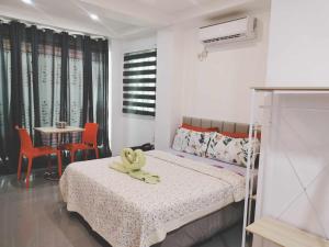 Postel nebo postele na pokoji v ubytování Bais Homestay Studio Room