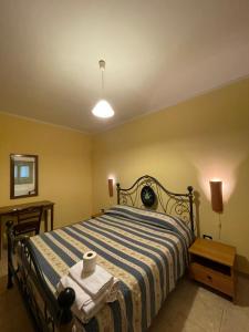 A bed or beds in a room at Agriturismo Salento Pietralata