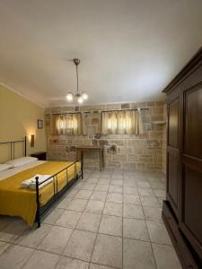 Postel nebo postele na pokoji v ubytování Agriturismo Salento Pietralata