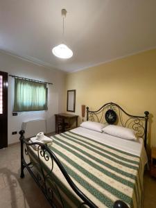 A bed or beds in a room at Agriturismo Salento Pietralata