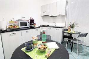 Kuchyň nebo kuchyňský kout v ubytování B&B Casa 28