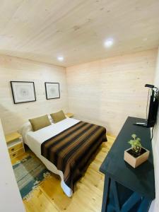 Postel nebo postele na pokoji v ubytování forest house - Cabaña para 4 + 16 fotografií