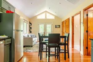 a kitchen and dining room with a table and chairs at Crows Nest Luxury Near Asheville in Marshall