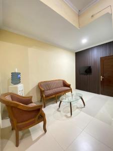 TV a/nebo společenská místnost v ubytování Merapi View Homestay + 11 fotografií